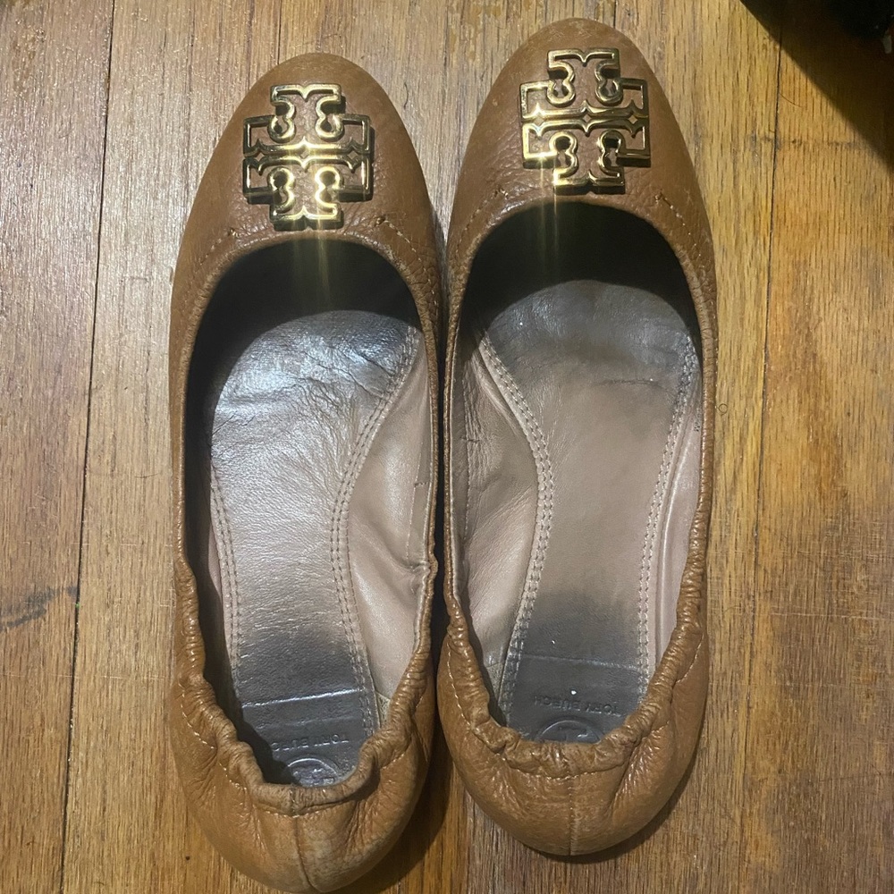 Well worn leather flats
